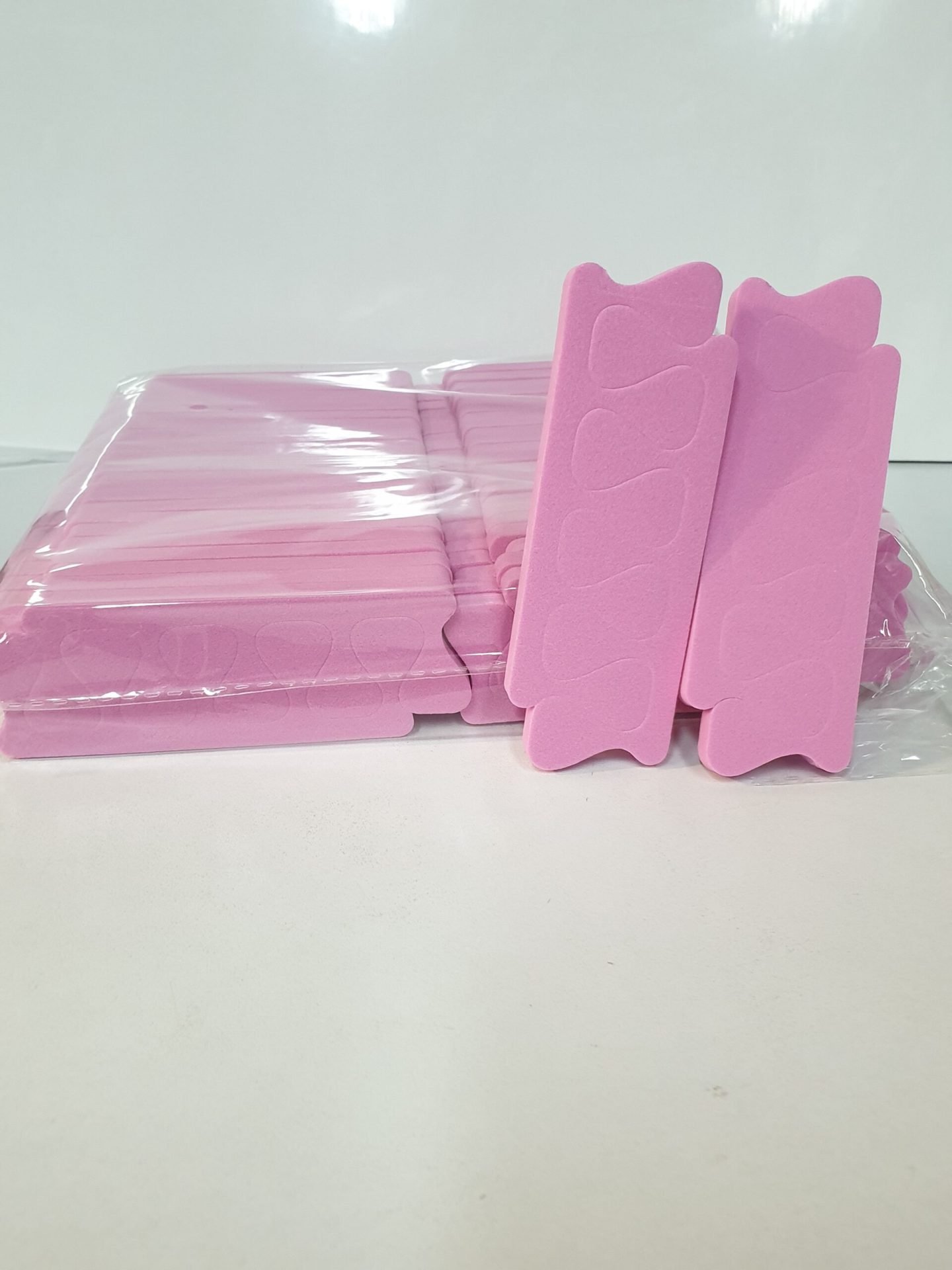 מפריד אצבעות קשיח ורוד 48 זוגות